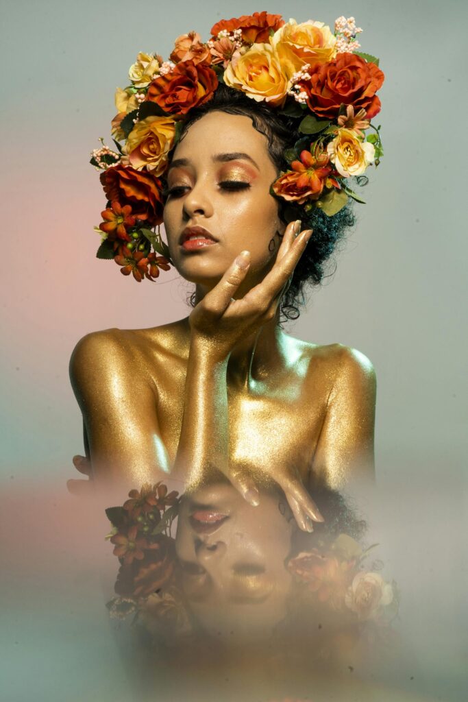 Topless Woman With Yellow and Orange Floral Headdress